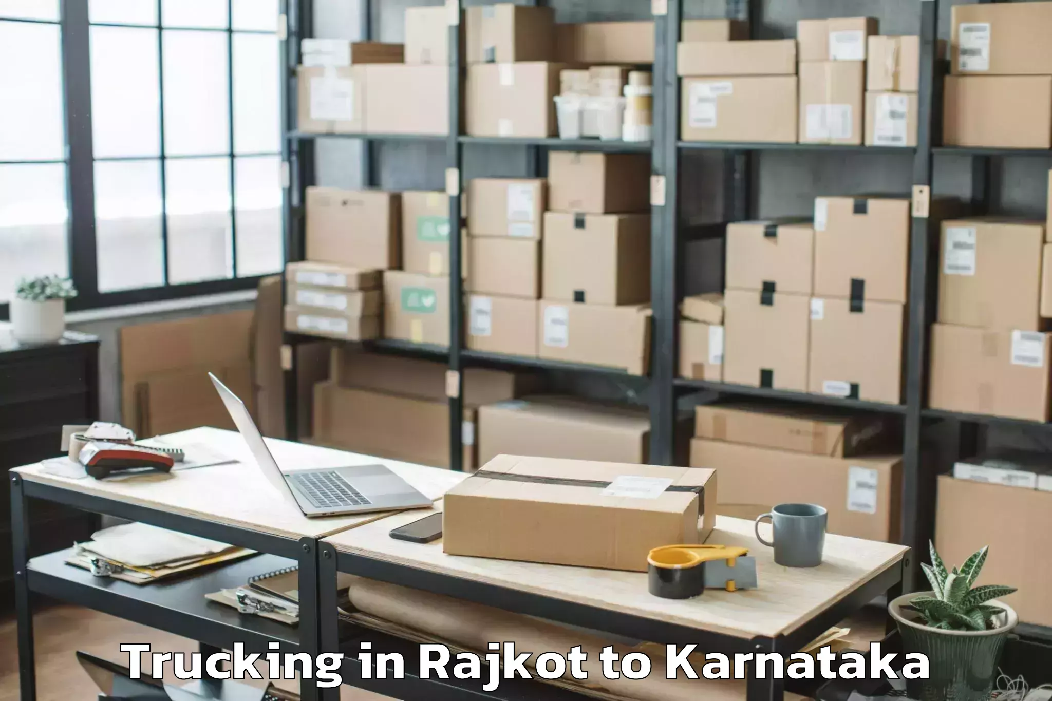 Quality Rajkot to Karempudi Trucking